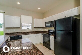 910 Countess Ave, Unit 3 in Lehigh Acres, FL - Foto de edificio - Building Photo