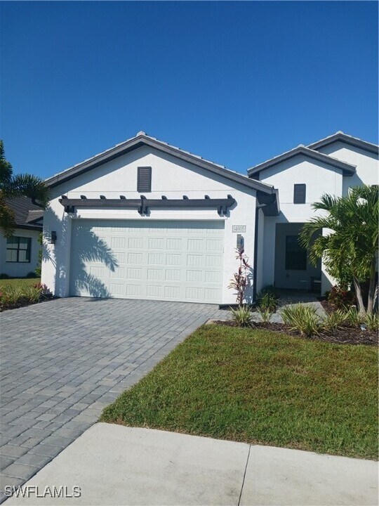 14605 Kingfisher Lp in Naples, FL - Building Photo