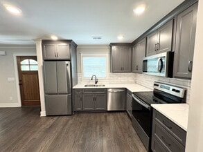 110 Strippling St in Ball Ground, GA - Foto de edificio - Building Photo