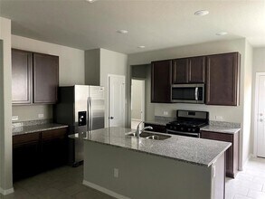 25654 Northpark Palm Dr in Porter, TX - Building Photo - Building Photo