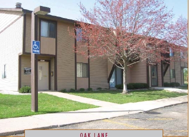 Oak Lane Apartments in Hopkins, MI - Building Photo