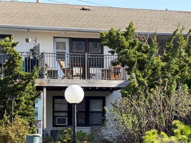 property at 65 E Broadway