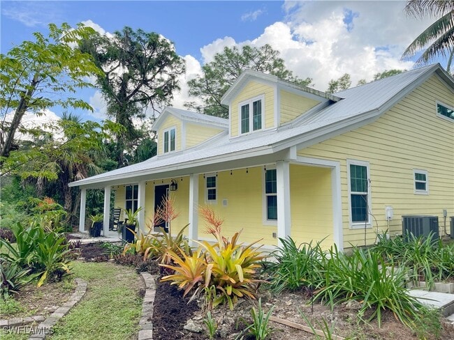 6130 Painted Leaf Ln in Naples, FL - Foto de edificio - Building Photo