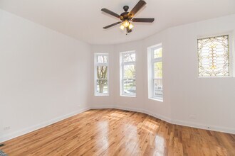 1704 W Sunnyside Ave, Unit 1 in Chicago, IL - Building Photo - Building Photo