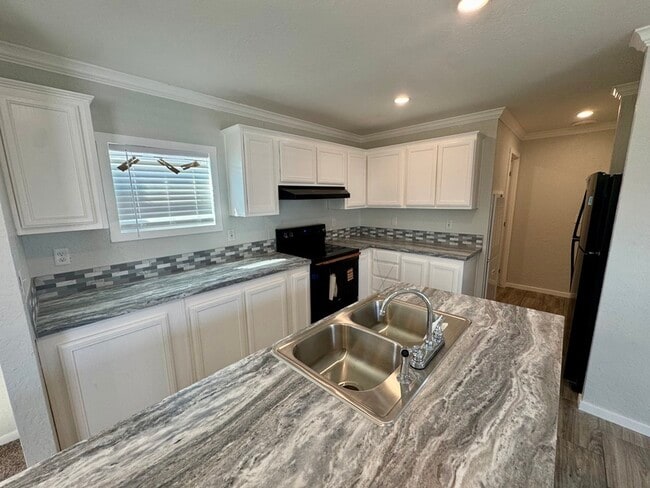 property at 5111 Caicos Calle