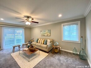 8 Williams Blvd, Unit 18-1C in Lake Grove, NY - Building Photo - Building Photo
