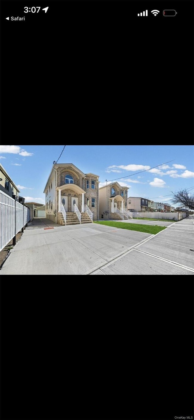 property at 115-23 143rd St