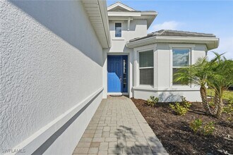 11964 Molto Dr in Miromar Lakes, FL - Building Photo - Building Photo