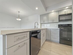 8590 SW 212th St in Cutler Bay, FL - Building Photo - Building Photo