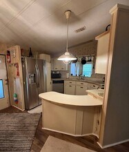 128 Needle Palm Ln in Naples, FL - Foto de edificio - Building Photo