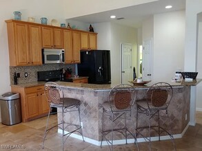 2800 Amberwood Ln in Naples, FL - Building Photo - Building Photo