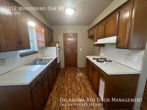 1012 Whispering Oak Rd in Oklahoma City, OK - Building Photo - Building Photo