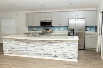 213 Talladega Ln in Polk City, FL - Building Photo - Building Photo
