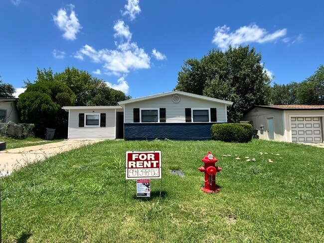 property at 1413 NW Ozmun Ave