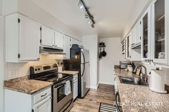 3141 S Tamarac Dr in Denver, CO - Building Photo - Building Photo