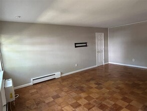1102 Town House Village in Islandia, NY - Building Photo - Building Photo