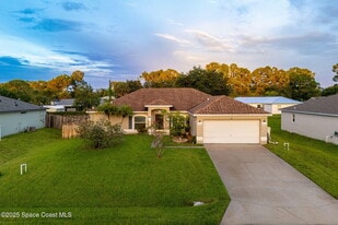 413 Grenadier Ave NW in Palm Bay, FL - Building Photo