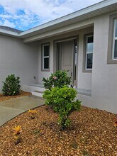 8343 Olsen St in Port Charlotte, FL - Building Photo - Building Photo