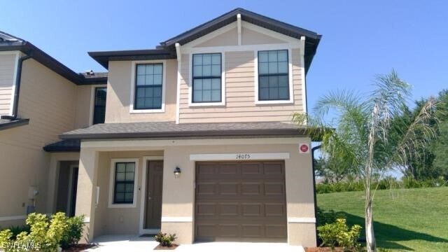 14075 Oviedo Pl in Tice, FL - Building Photo