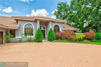 7401 W Cypresshead Dr in Parkland, FL - Building Photo - Building Photo