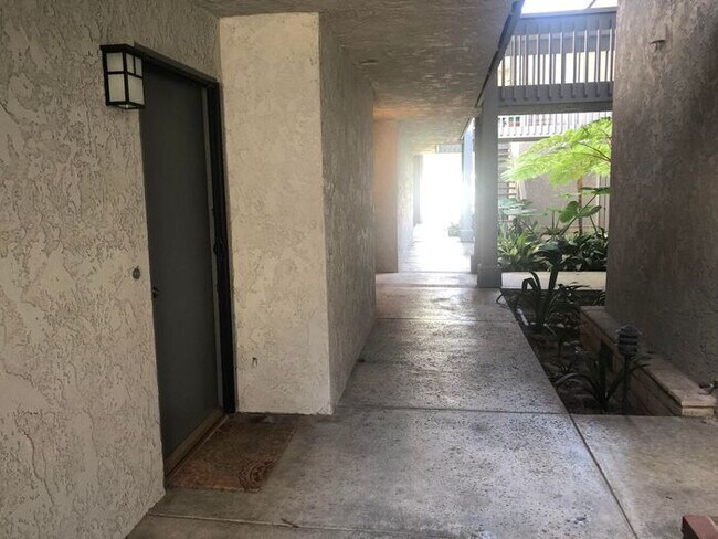 16872 Pacific Coast Hwy-Unit -102 in Huntington Beach, CA - Building Photo - Building Photo