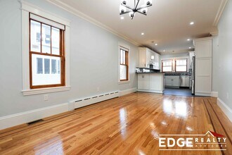 60 Langley Rd, Unit 1 in Boston, MA - Foto de edificio - Building Photo
