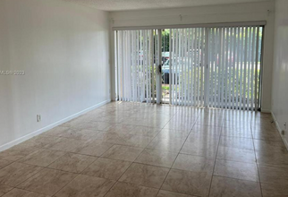 8741 Wiles Rd, Unit 103 in Coral Springs, FL - Building Photo - Building Photo