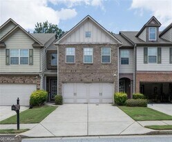 1555 Creek Bend Ln NW in Lawrenceville, GA - Building Photo