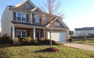 8430 Magnolia Springs Dr in Harrisburg, NC - Building Photo