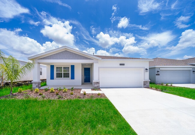 26340 FEATHERGRASS Cir in Leesburg, FL - Building Photo - Building Photo