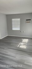 145 E Alachua Ln in Cocoa Beach, FL - Building Photo - Building Photo