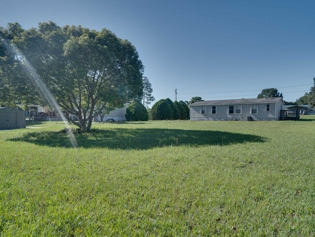 7710 Co Rd 109G in Lady Lake, FL - Building Photo - Building Photo