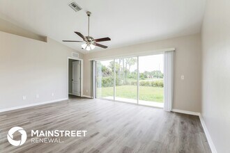 104 Zona Ave N in Lehigh Acres, FL - Building Photo - Building Photo