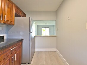 6001 Shaker Wood Cir in Tamarac, FL - Building Photo - Building Photo