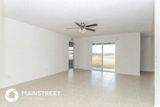 1724 Canaan Lp in Dundee, FL - Foto de edificio - Building Photo