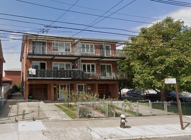 property at 57-32 136th St