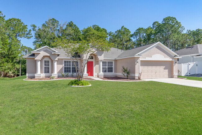 96 Whispering Pine Dr in Palm Coast, FL - Building Photo - Building Photo