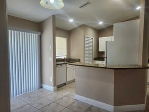 217-219 Hightower Ave S in Lehigh Acres, FL - Building Photo - Building Photo