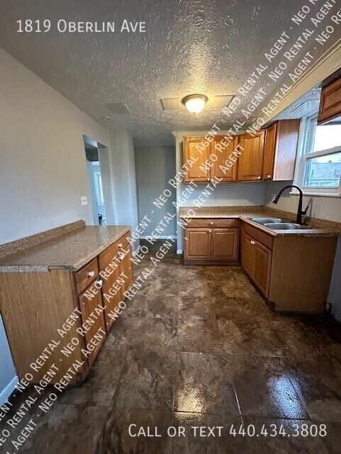 1819 Oberlin Ave in Lorain, OH - Building Photo - Building Photo