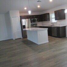 1726 SE Minorca Ave in Port St. Lucie, FL - Building Photo - Building Photo