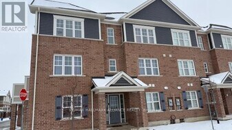 1000 Asleton Blvd in Milton, ON - Building Photo