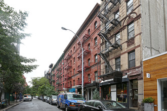 247-251 Elizabeth St in New York, NY - Building Photo - Building Photo