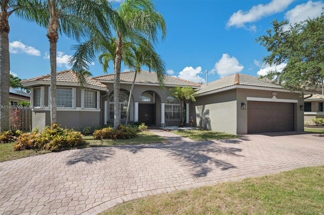 property at 13742 NW 16th St