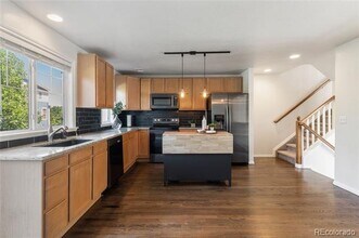 10773 Belle Creek Blvd in Commerce City, CO - Building Photo - Building Photo