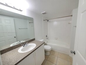 5041 Wiles Rd in Coconut Creek, FL - Building Photo - Building Photo