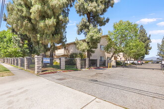 Mango Tree Apartments in Fontana, CA - Building Photo - Building Photo