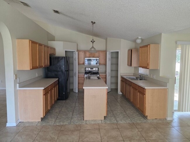 15 Catalina Ct in Kissimmee, FL - Foto de edificio - Building Photo
