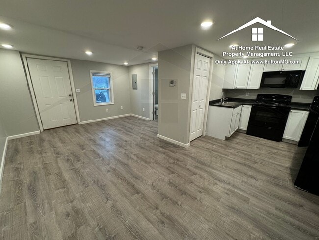 property at 103 E 3rd St