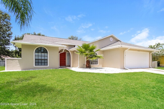 1388 Tilberg Ave NW in Palm Bay, FL - Building Photo - Building Photo
