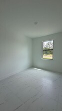 1105 Dean St E in Lehigh Acres, FL - Building Photo - Building Photo